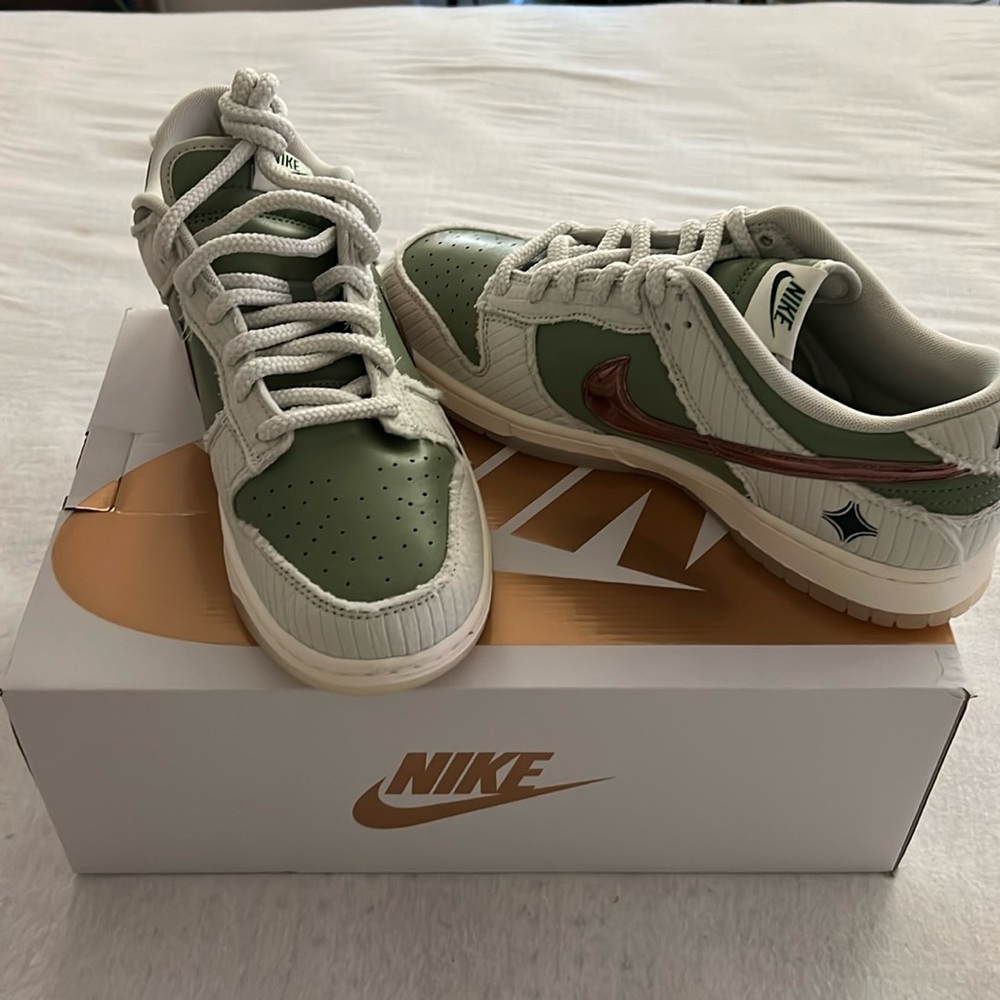 Nike Dunk Low Retro PRM size 11 mens. The color is sea glass/rose gold sail. New